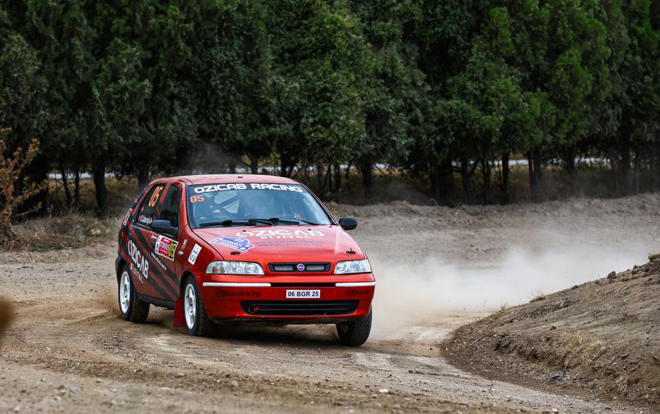 Rally podium, tire marks, speed blur