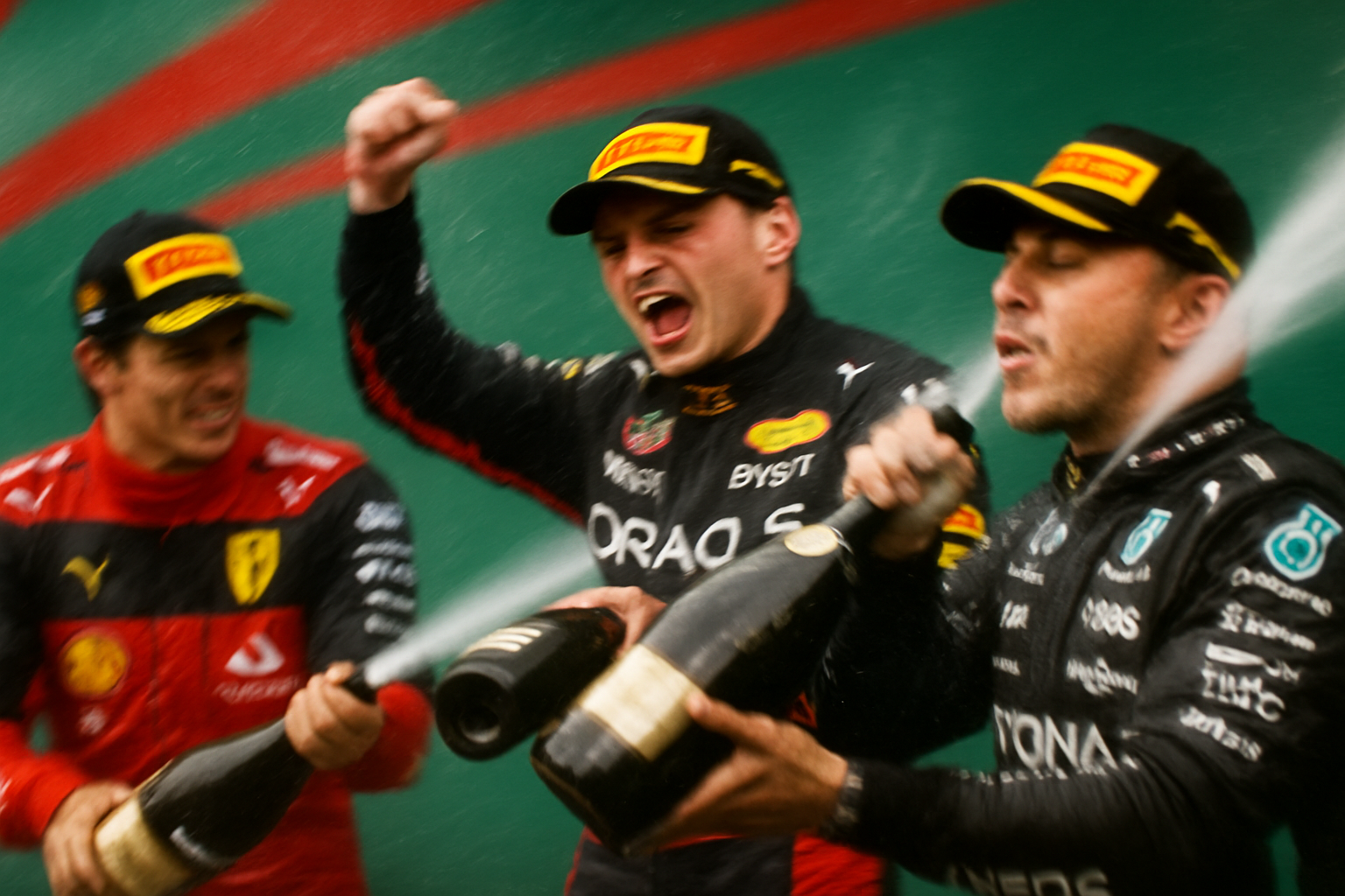 Podium celebration, close-up of drivers, dynamic speed blur